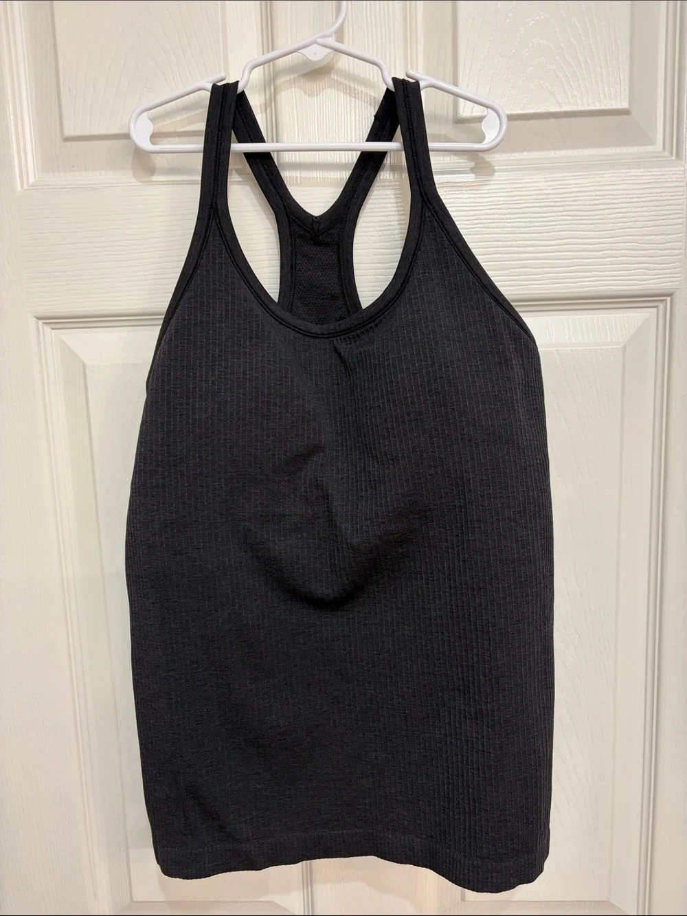 047. Lululemon Ebb To Street Tank II Black size 10 with pads